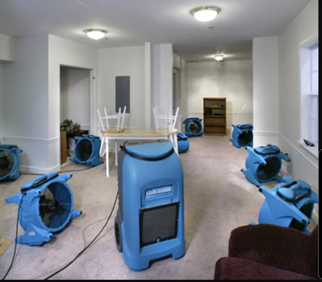 Air movers and dehumidifier setup for Water Damage Restoration in Purcell